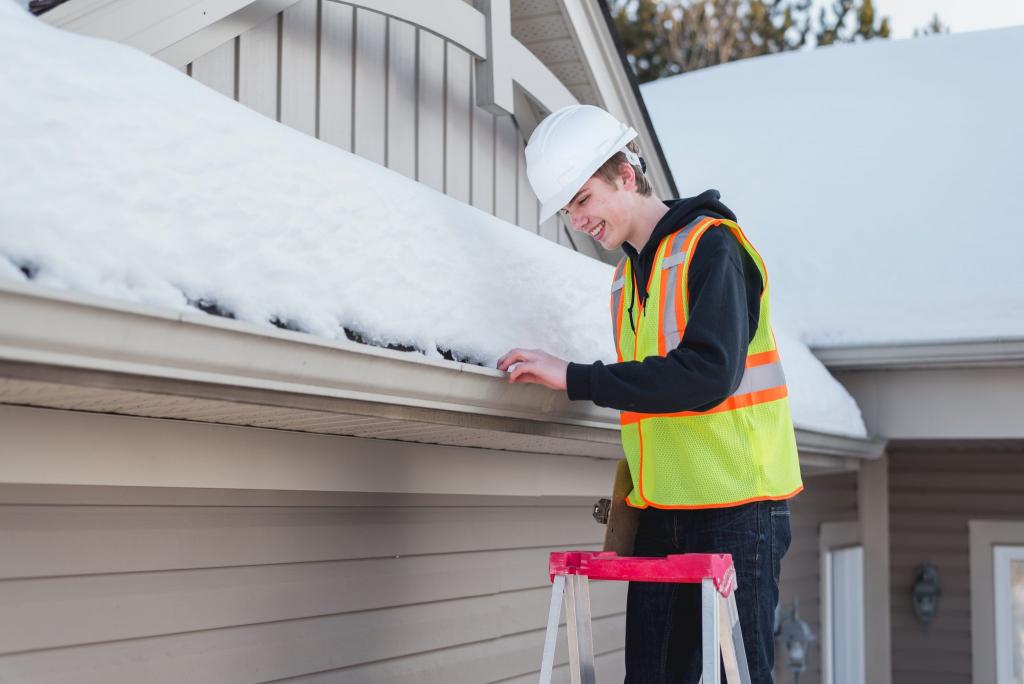 snow and ice on gutters