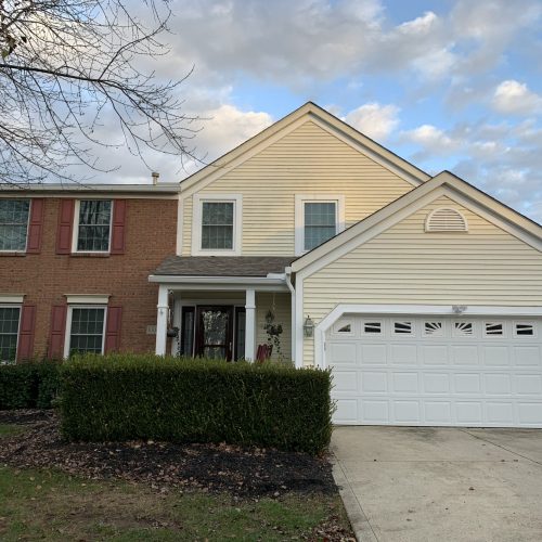 front view cream colored house