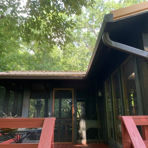 front porch with gutters and downspout