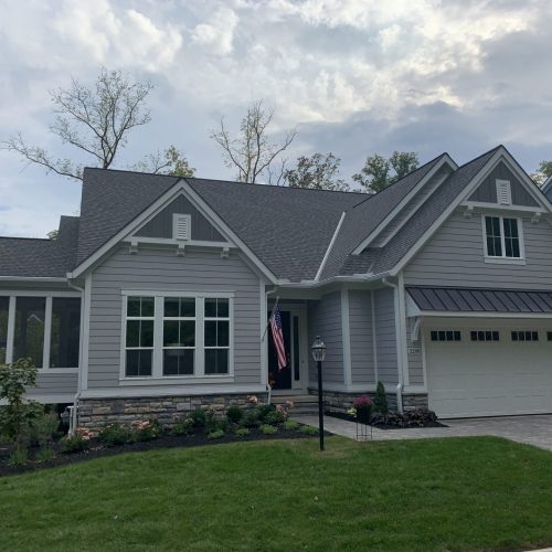 gray house view of garage