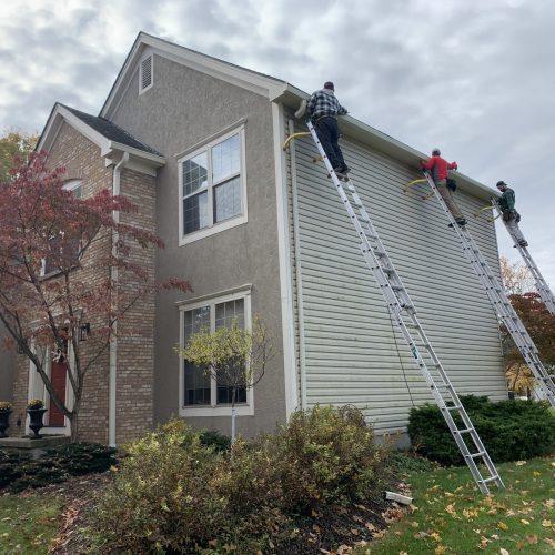 workers fixing the roof