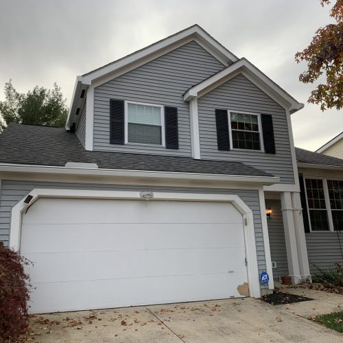 gray house black shutters